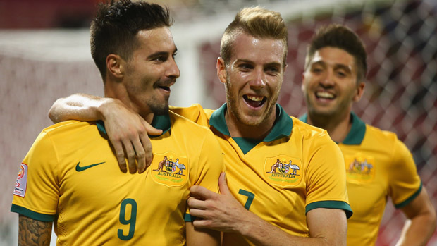Jamie Maclaren celebrates after scoring Australia's second against Vietnam.
