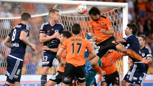Brisbane Roar's Thomas Broich heads home the winner in stoppage time at Suncorp Stadium.